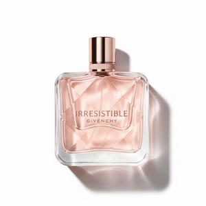 Givenchy Irresistible EDP 80ml bottle - professional top-down photography showing square glass bottle with pink liquid and rose gold cap on white background